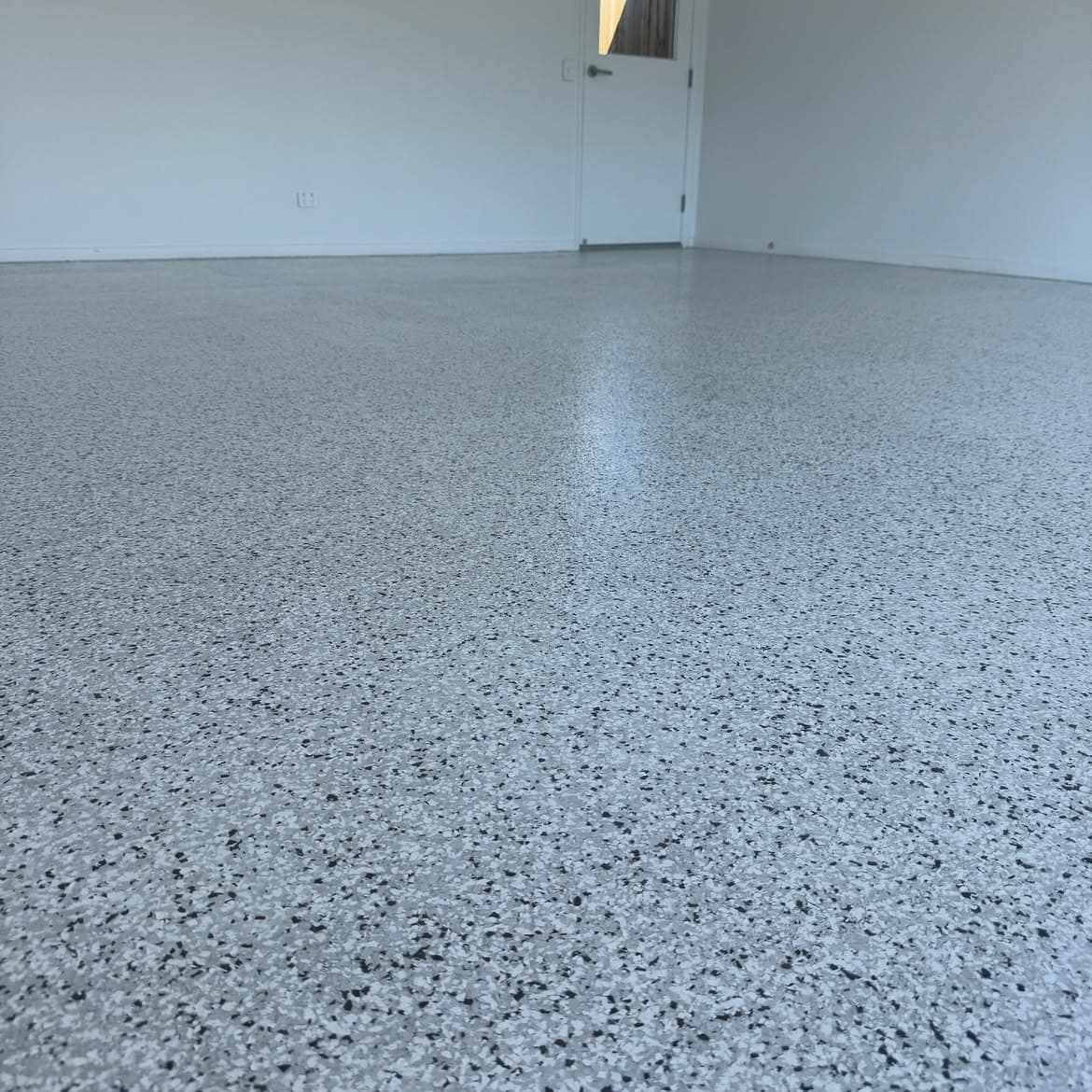 Close-up of grey epoxy flake finish