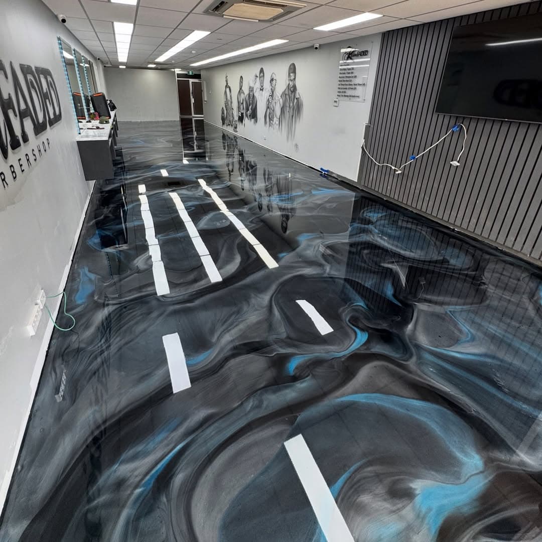 Black and blue metallic epoxy floor